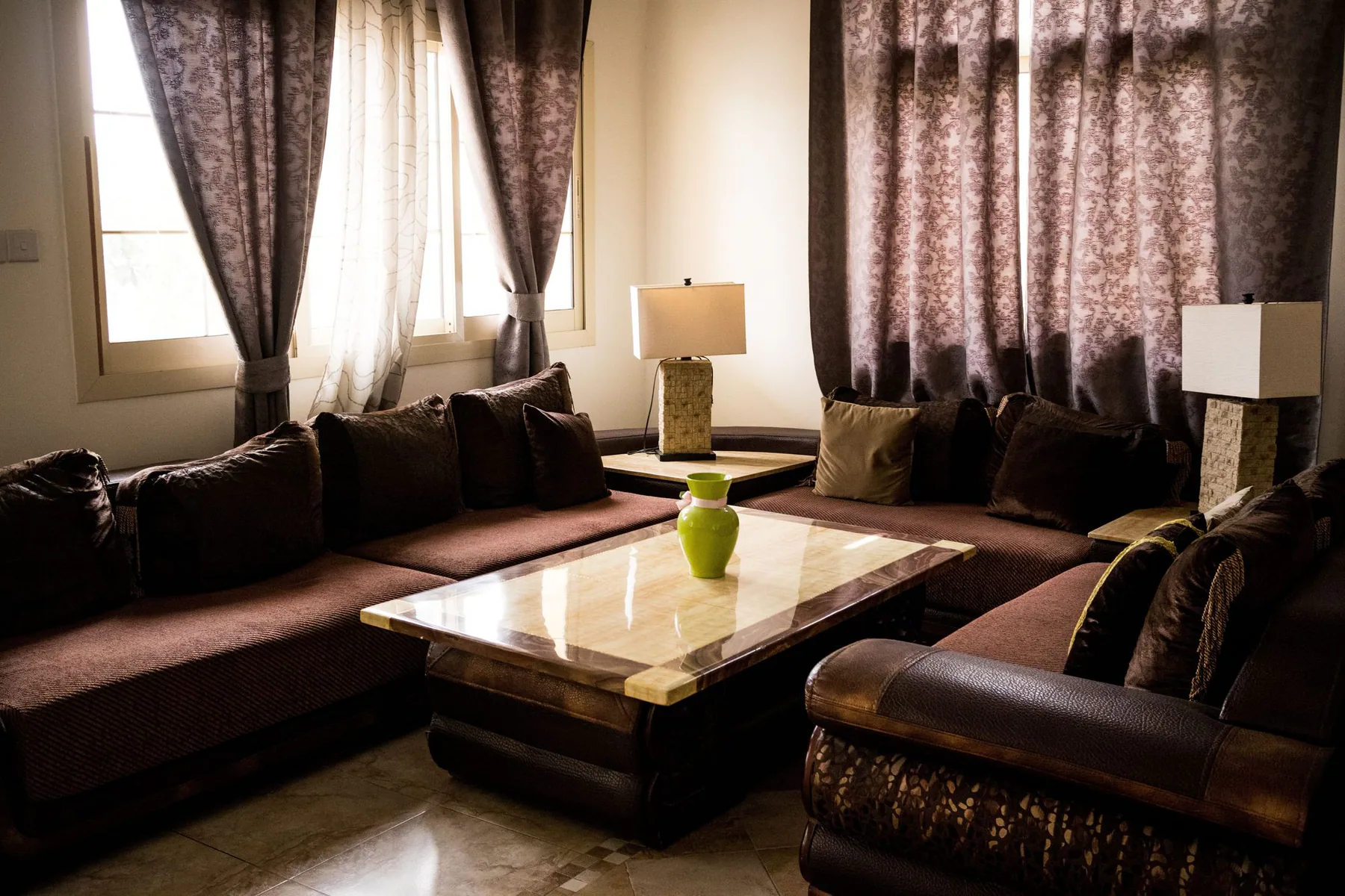 Curtains framing a comfortable living room